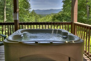 Soak in the hot tub at Bella Vista, while enjoying the mountain view