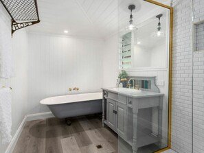 The original restored claw foot bath is divine!   Relax and refresh with the tasteful gold accents and freshly renovated spaces. 