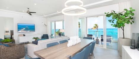 Welcome to #201 at the Rum Point Resort. This second floor condo spans 2,829 sq. ft. with 2 oceanfront suites, and 2 guest suites. 