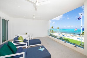 Private roofed balcony overlooking the oceanfront. 