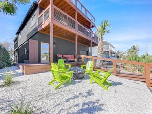 Gather around our fire pit after a day at the beach.