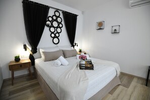 Olive Forest Villa- Bedroom with king size bed and access to the balcony