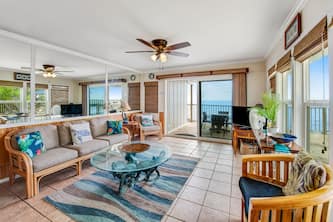True oceanfront, ground-floor condo with 180-degree view, pool & lanai