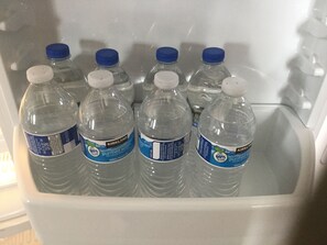 We got you covered with some complimentary water bottles in the refrigerator.