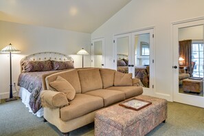 Sleeping Area | King Bed | Towels & Linens | Smart TV | Wall A/C | Books