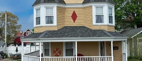 Front of the house. Victorian house built in 1880. Modern interior.