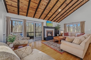 Open Living Area with an Electric Fireplace!