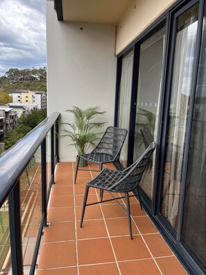 Private covered balcony, river views