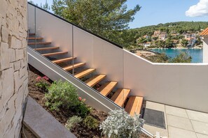 Stairs leading to the first floor of Croatia luxury villa Ideali next to the beach in Vrboska