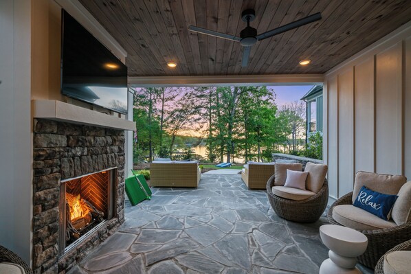 Enjoy outdoor space on the terrace level with a fireplace and comfort!
