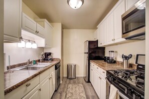 Fully-equipped kitchen for culinary adventures.