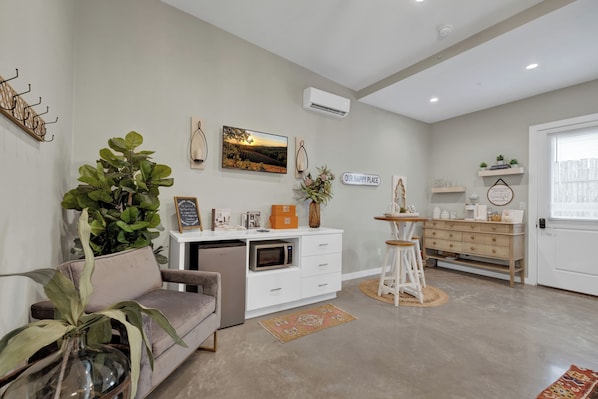 Enjoy the flat screen TV while enjoying a morning cup of coffee.