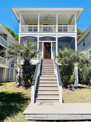 Returning home by way of the shared dock.  This porch faces the tidal creek and ocean.