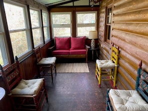 Large covered porch to escape the rain or just chill.
