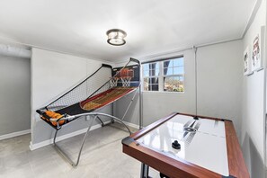 Basketball and mid-size air hockey arcade games.