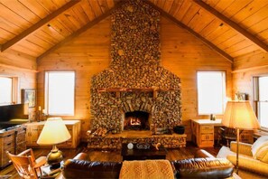 The  fireplace rocks were gathered on the property as part of a local fundraiser