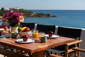 “Dine with a view – our balcony’s big table offers breathtaking sea panoramas