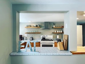 Modern, fully-stocked kitchen