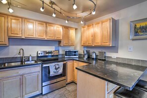 Well-Equipped Kitchen | Elevator Access | Downtown Location