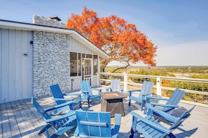 Enjoy the firepit and the stargazing deck with comfortable chairs with 180 degree lake views off the main living room / kitchen area.