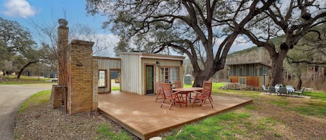 Two separate units. This is the Bed/bath unit perched on a deck.
