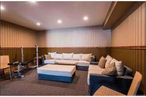 Building main room - sitting area and laundry located here (right below condo)
