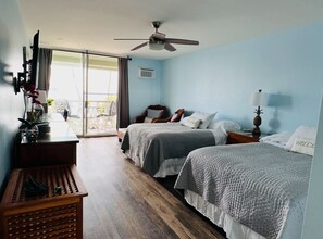 2 full size bed looking at the ocean