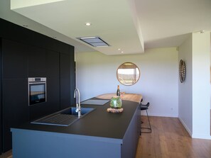 Fully-equipped kitchen - 2 fridges - Freezer - Jura coffee machine / Electric kettle - Dishwasher - Bar table for 5/6 people.