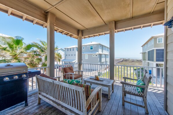 Outdoors - Covered deck with seating