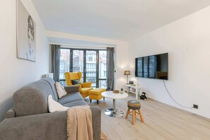 Spacious living room with sofa bed