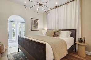 Indulge in the ultimate comfort and convenience during your stay with a spacious master bedroom featuring a king size Westin Heavenly bed and an attached office - the perfect way to recharge and stay productive during your trip to St. Augustine 
