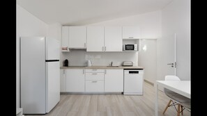 A fully equipped kitchenette with all the amenities you may require to prepare a delicious homecooked meal. #apartment #summer #comfort #algarve