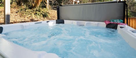 Indulge in the luxurious hot tub, recently installed to provide ultimate relaxation and rejuvenation during your stay