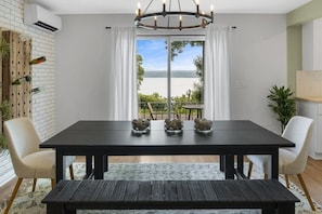 Enjoy every meal or gathering in this modern dining table.