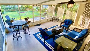 Enjoy morning coffee, dining al fresco, evening cocktails on oversized porch.