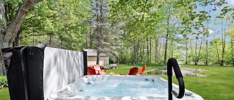 Soak your cares away in our hot tub overlooking the Lilypad pond.