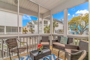 Side deck. Leads out from kitchen and main floor bedroom