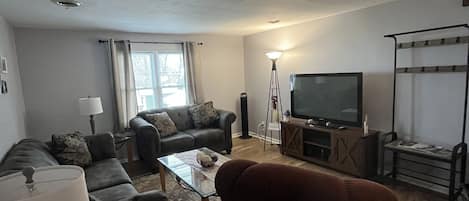 Livingroom with Roku enabled TV and soundbar. 