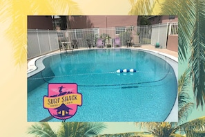Condo complex features s nice sunny pool area