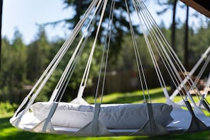 Relax and drift away in the twin hammock chairs