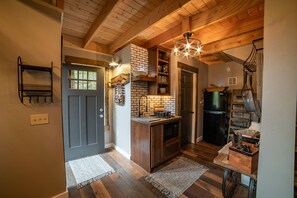 Downstairs entrance to kitchen,dining, and full bathroom.