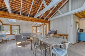 Opposite view of dining + living area (POV: as you walk in). Kitchen to right.