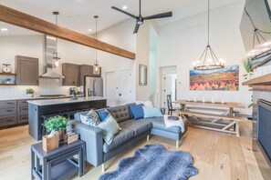 Living Room - Open Concept Layout with 16 Foot Vaulted Ceilings with Accent Beam (2nd Floor)