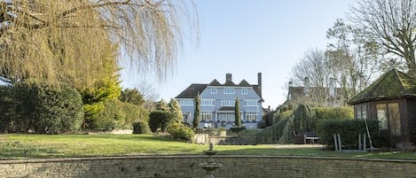 Back view of house from middle of the extensive garden 