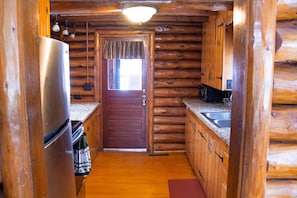 Fully stocked kitchen with silverware, dishes, glasses, toaster, microwave. etc.