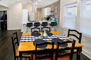 Dining table with seating for 6 and the bar has seating for 4