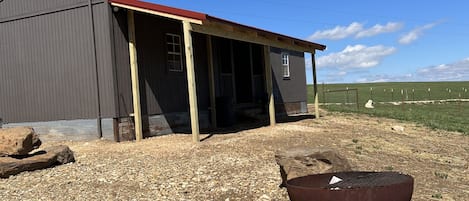 Front of Cabin with Fire Pit