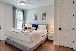 Primary Bedroom featuring a King size bed and a flat-screen SMART TV.