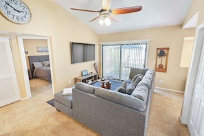 Living Room with 75 inch TV- All your favorite streaming services included.