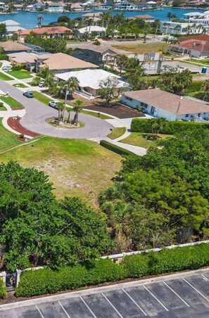 Take this path to the gate. This access cuts the walk to the beach access, the JW Marriott & other locations in half versus any map app directions.